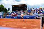 Nino Toto rushes to the ball (Tennis)