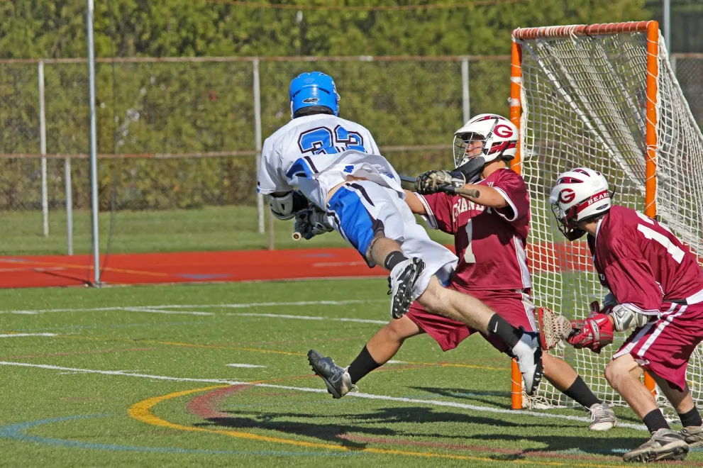Sportprogramm Lacrosse Kunstrasenplatz