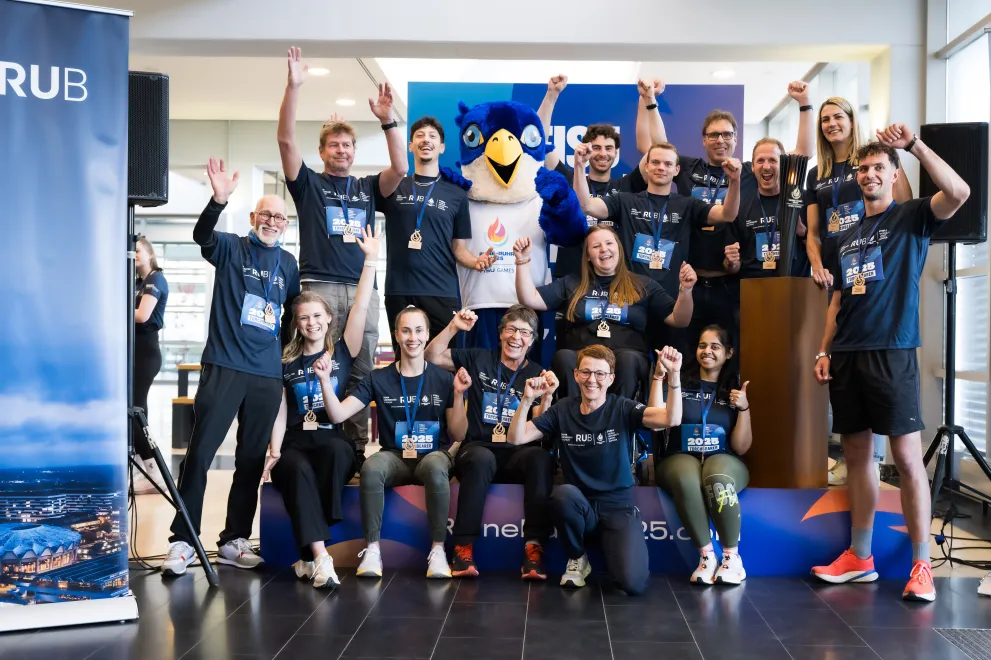 Team photo - relay runners with the FISU Games mascot “Wanda”
